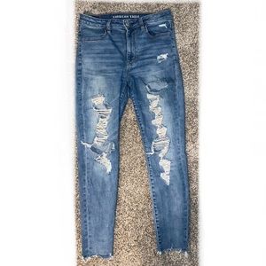 medium to light wash high waisted American eagle ripped jeans size 8